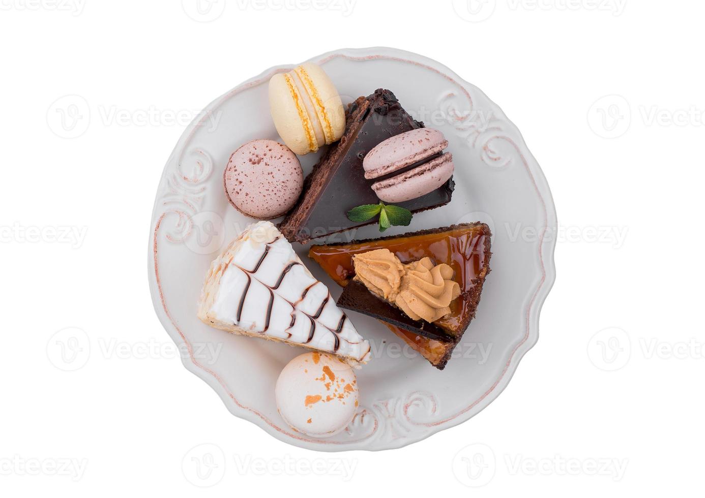 2550 White plate with three differents types of desserts isolate on a transparent background photo