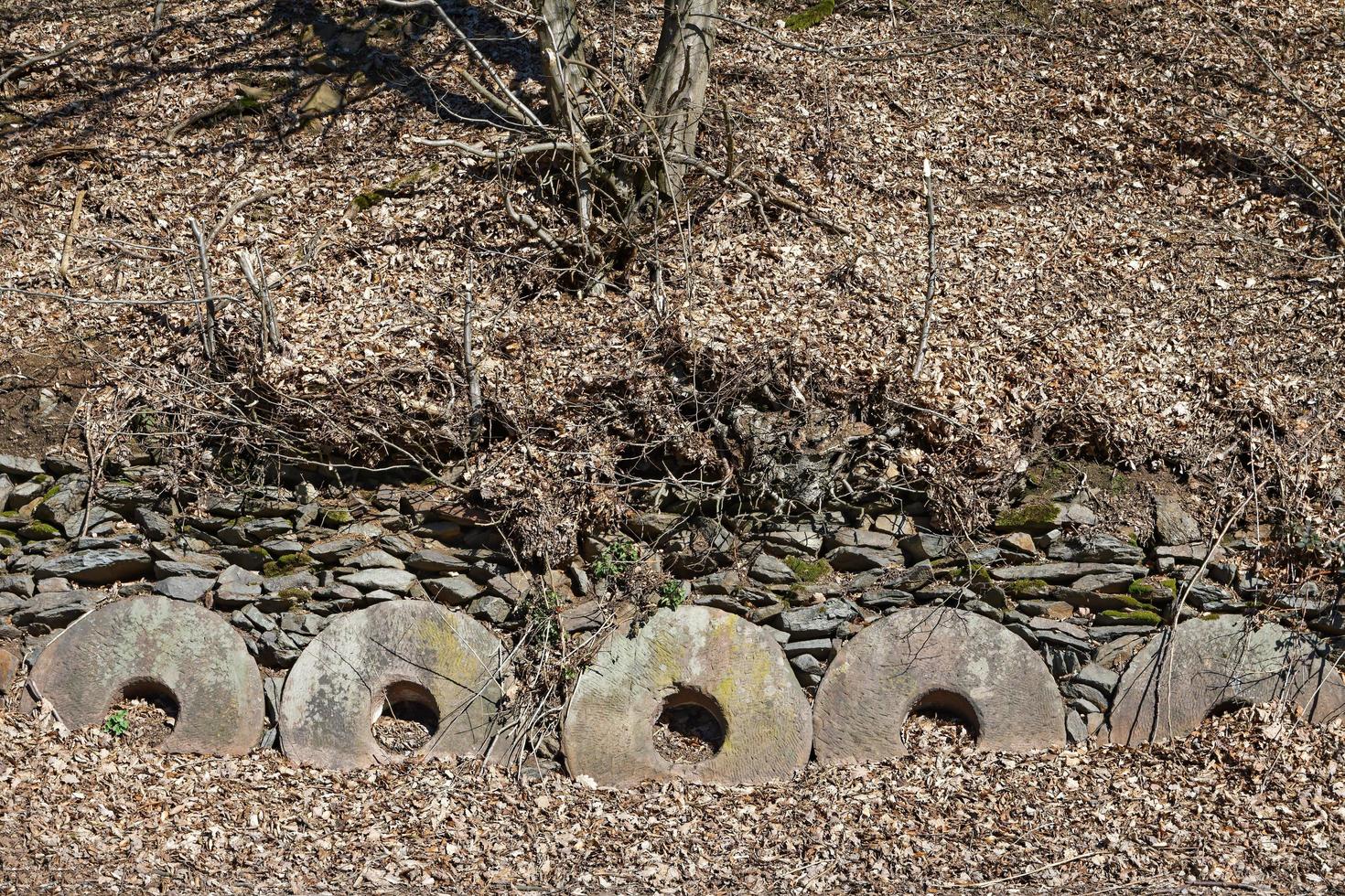 historic grinding stones in Solingen,Balkhauser Kotten,Bergisches Land,North Rhine Westphalia,Germany photo