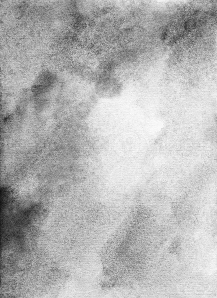 Watercolor old grunge light gray background texture. Grey stains on paper overlay. Monochrome textured backdrop photo