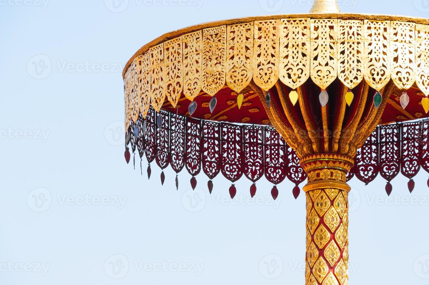 tiered umbrella Gold ,art thai ,Wat Phra that hariphunchai Lamphun Thailand photo