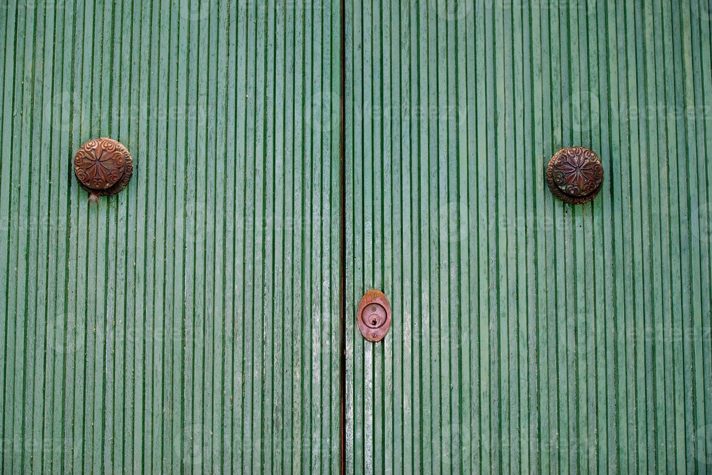 Old green painted wood door photo