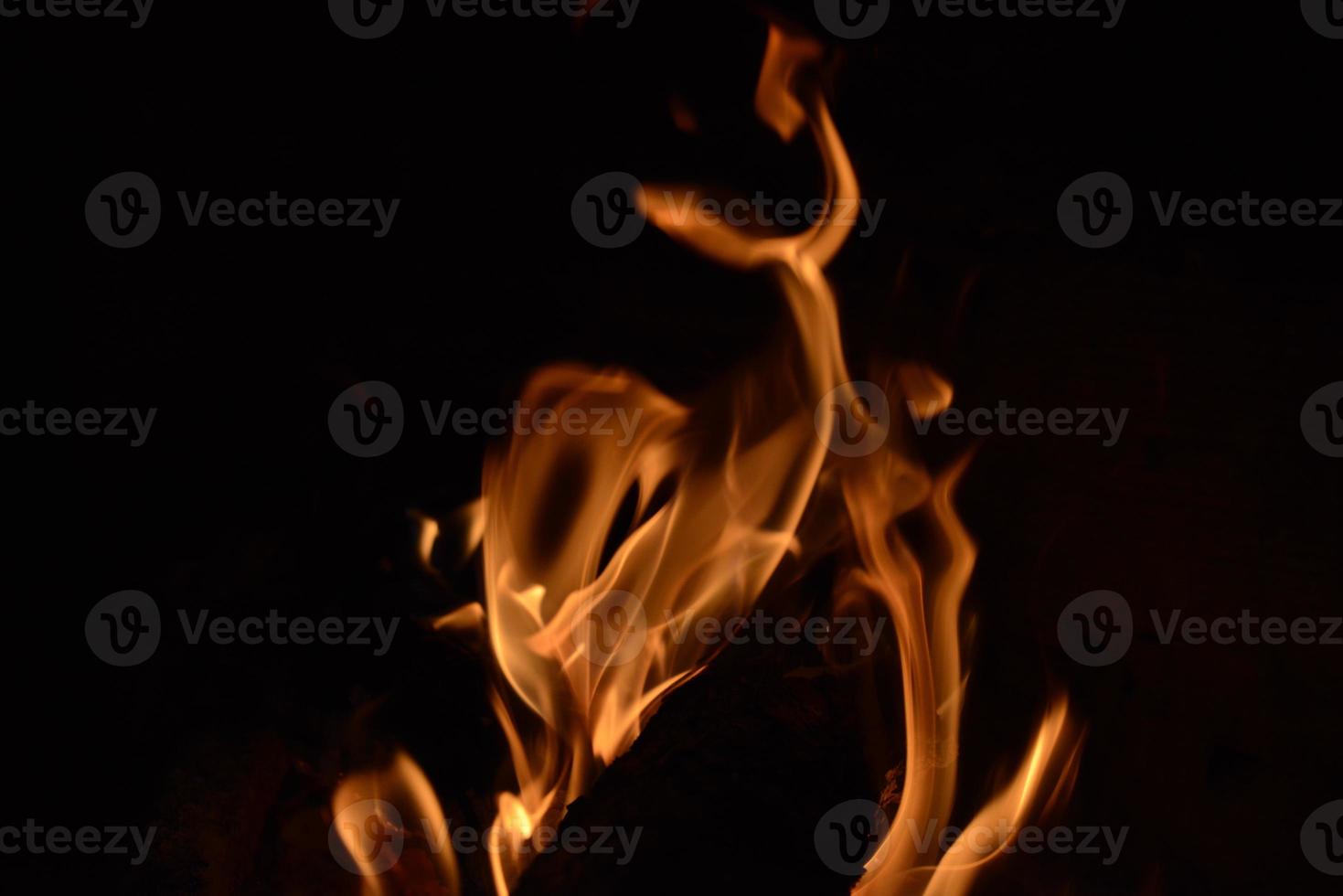 Flames on black background photo