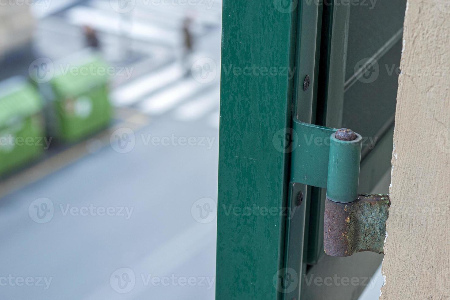 window green shutter in italy detail of holder photo