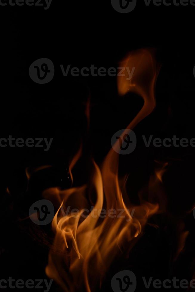 Flames on black background photo