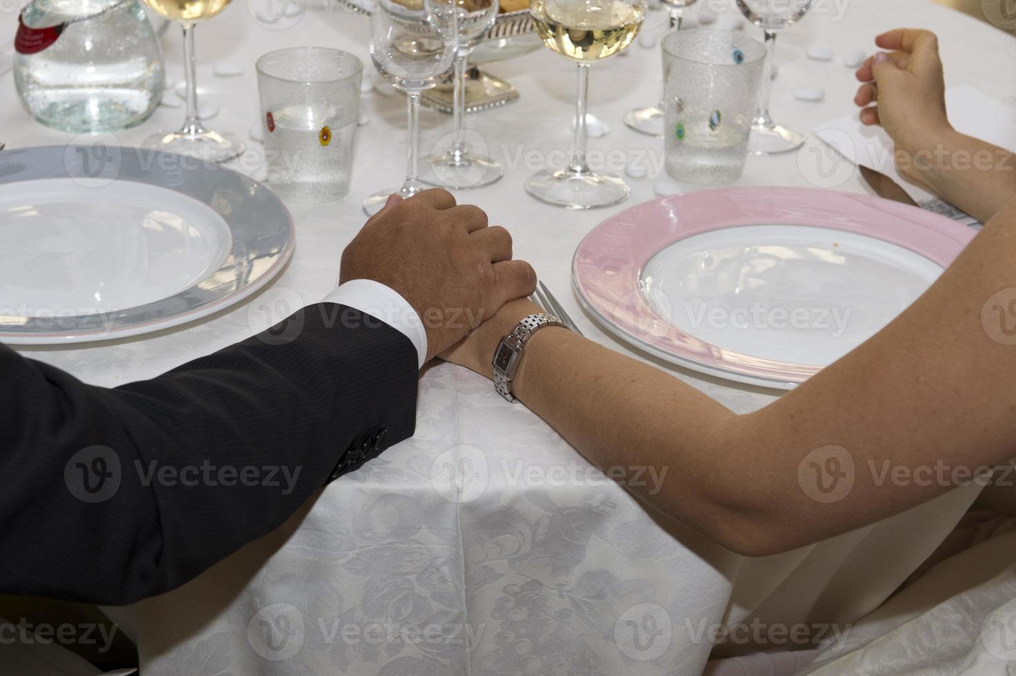 Wedding crossed hands photo