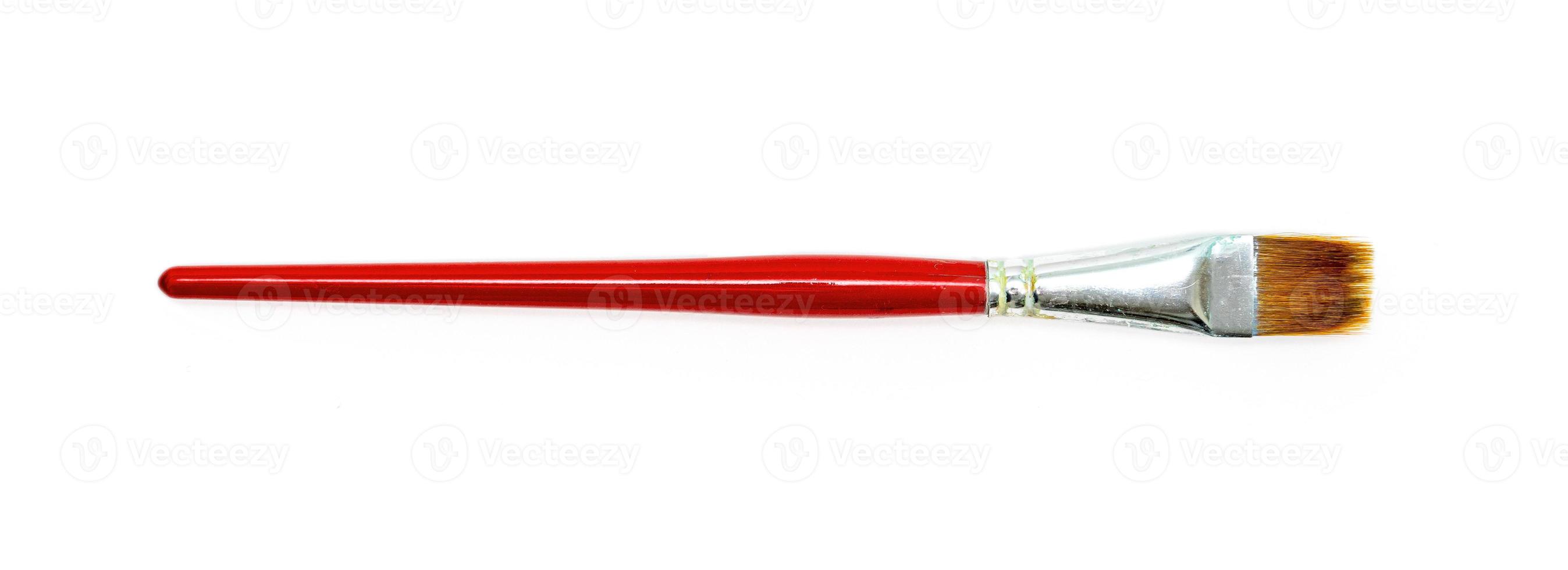 Red watercolor paint brushes on white background. Flat brushes. photo