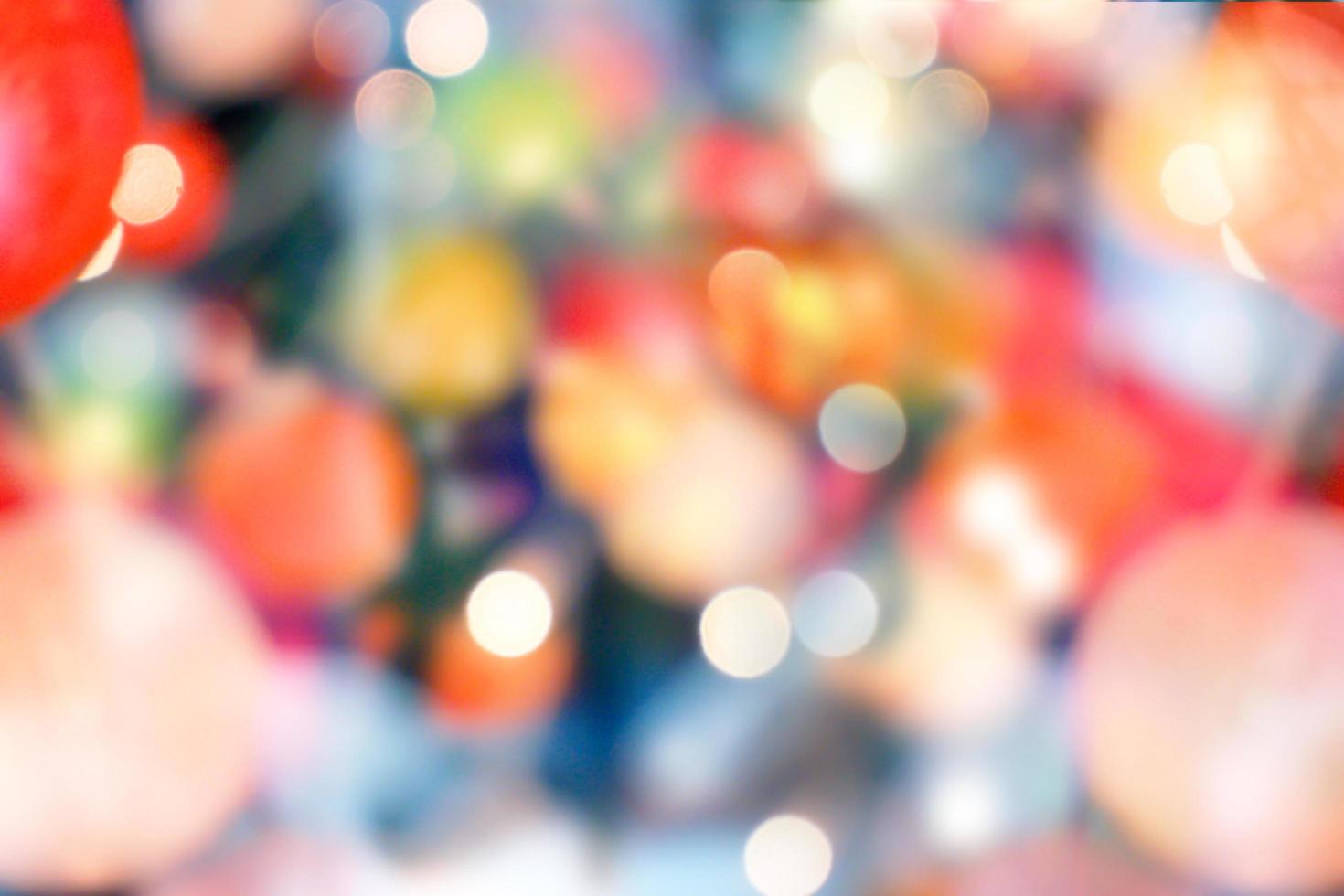 Abstract colorful bokeh and blurred reflection lighting on black background photo