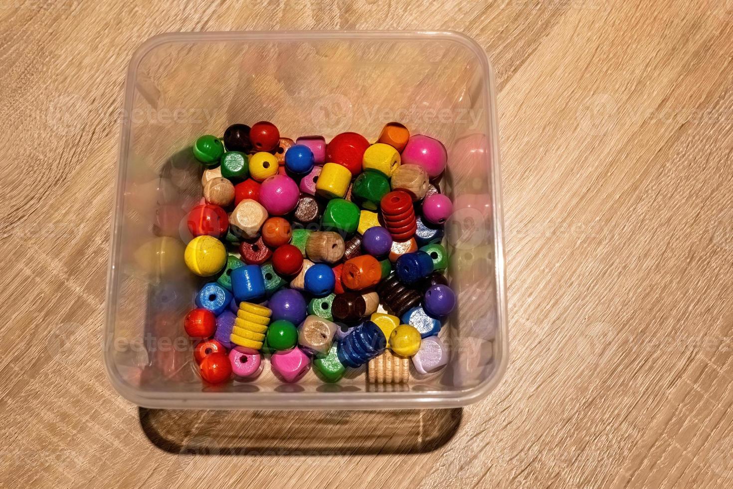 colourful small wooden blocks for handicrafts photo