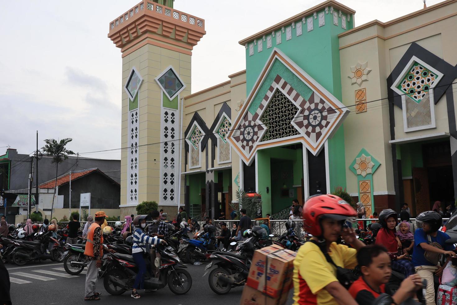 Tegal, December 2022. Photo of the motorbike parking lot in the Tegal city square which is crowded and full of motorcycle visitors.