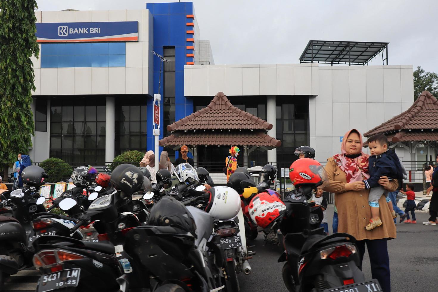 Tegal, December 2022. The atmosphere of the Tegal city square in the afternoon with many tourists visiting. photo