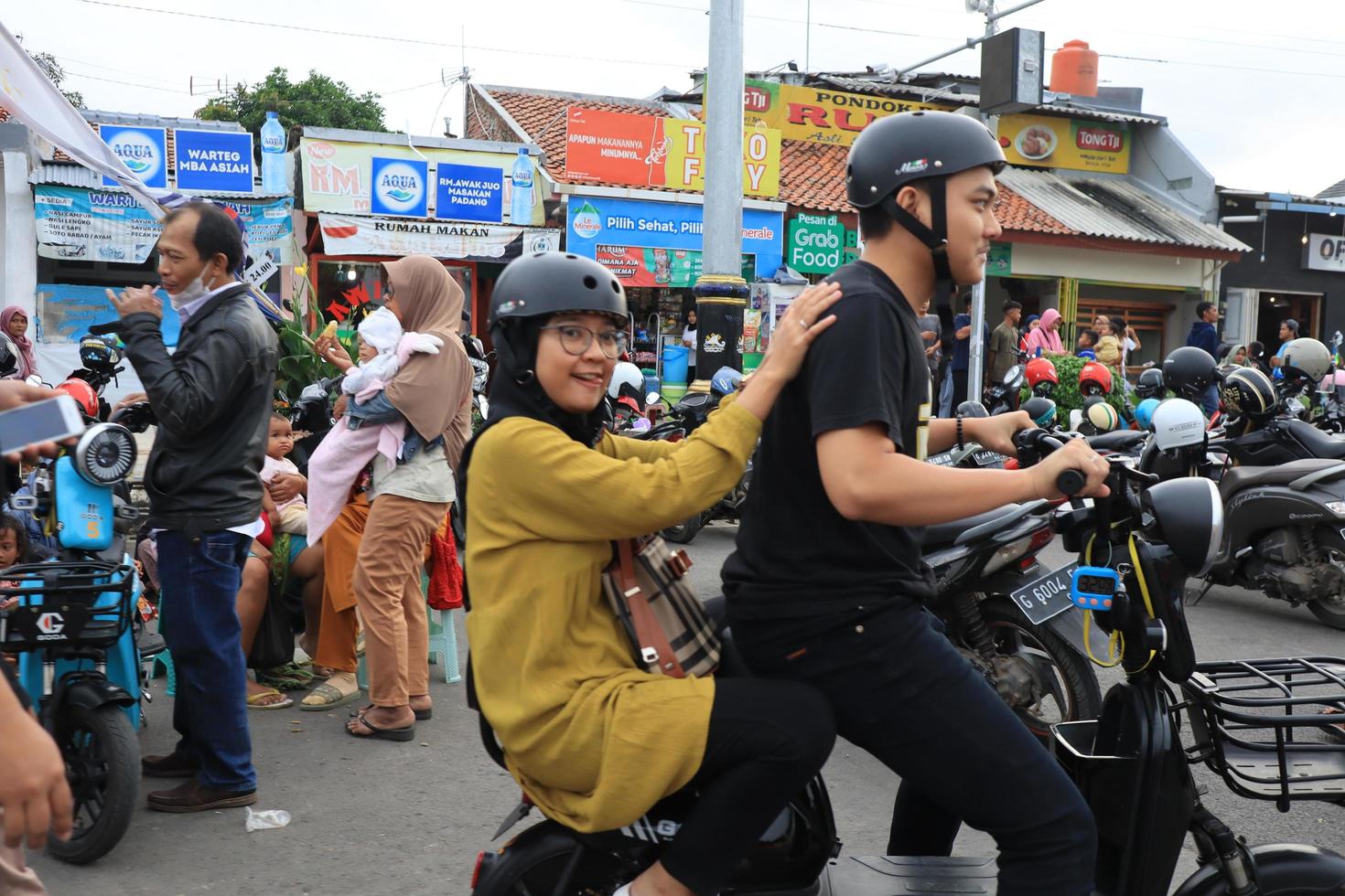 Tegal, December 2022. The atmosphere of the Tegal city square in the afternoon with many tourists visiting. photo