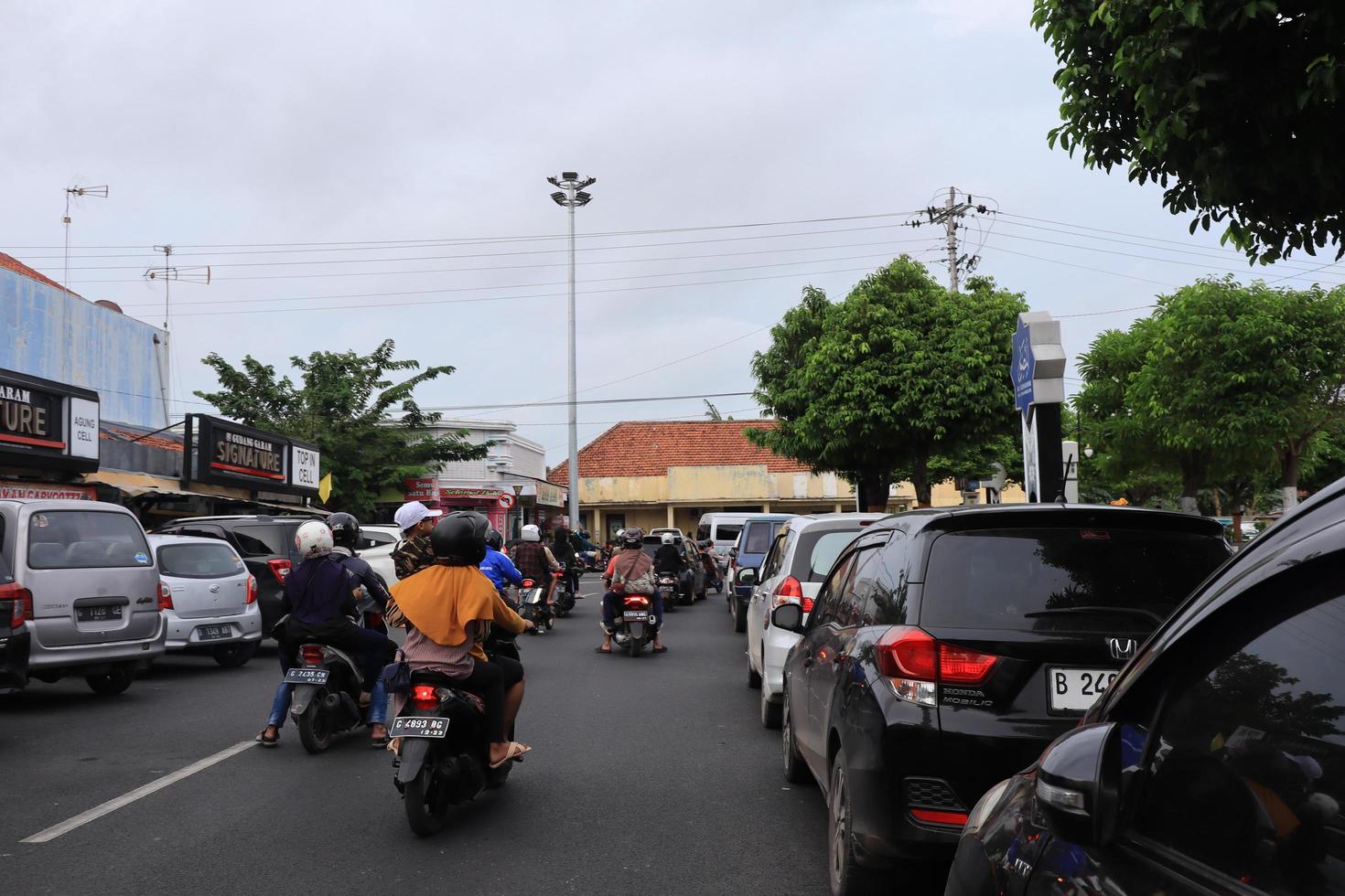 Tegal, December 2022. The atmosphere of the Tegal city square in the afternoon with many tourists visiting. photo