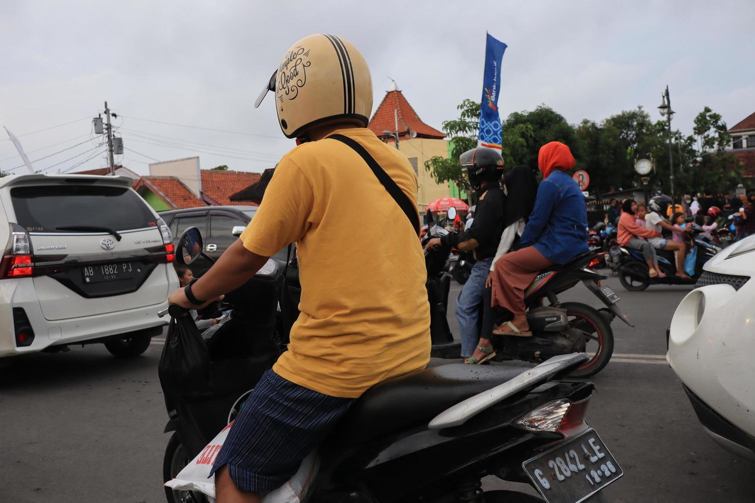 Tegal, December 2022. The atmosphere of the Tegal city square in the afternoon with many tourists visiting. photo