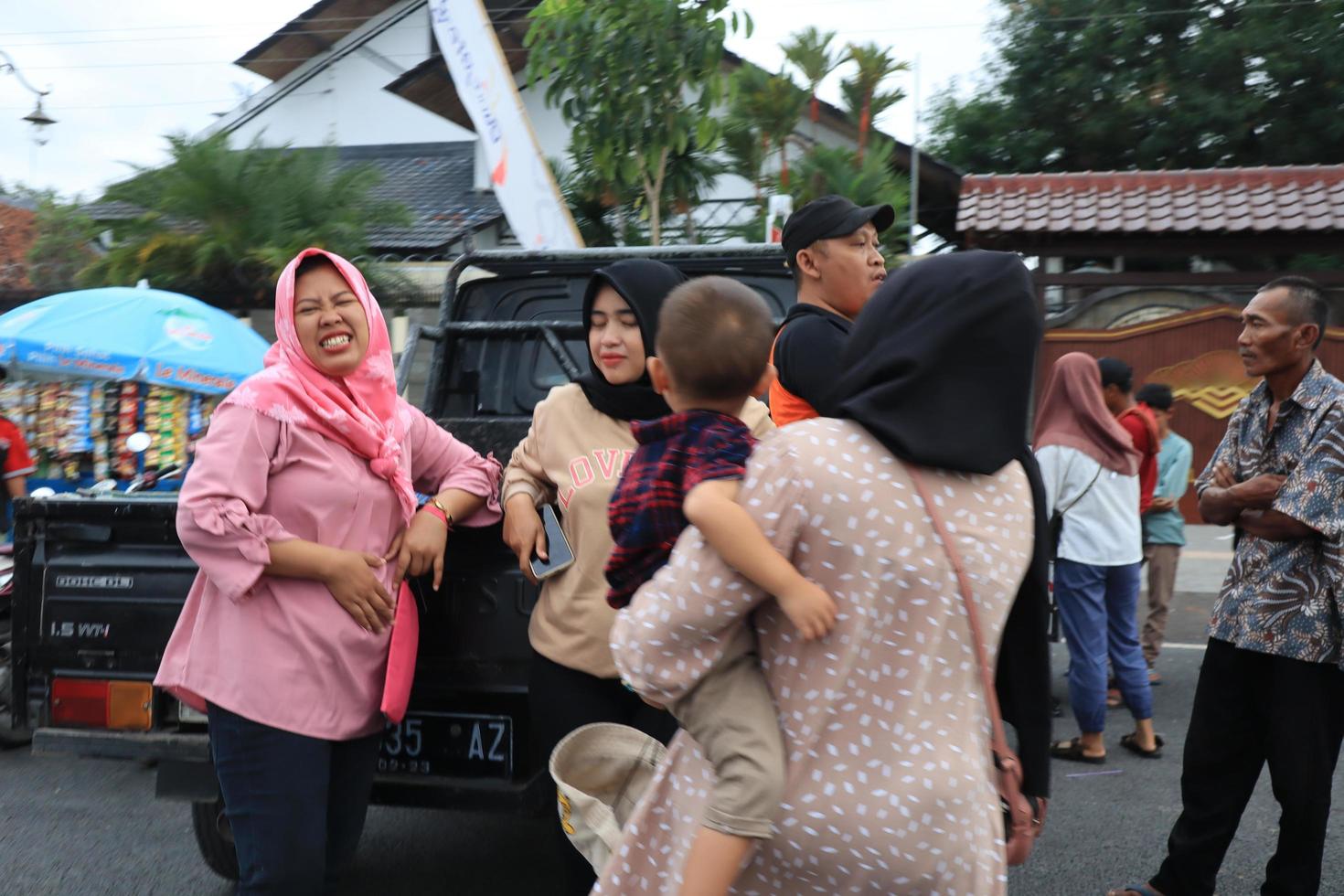 Tegal, December 2022. The atmosphere of the Tegal city square in the afternoon with many tourists visiting. photo