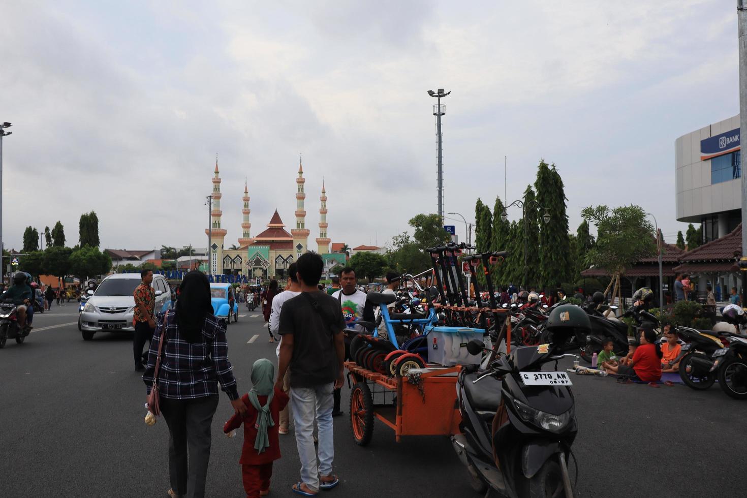 Tegal, December 2022. The atmosphere of the Tegal city square in the afternoon with many tourists visiting. photo