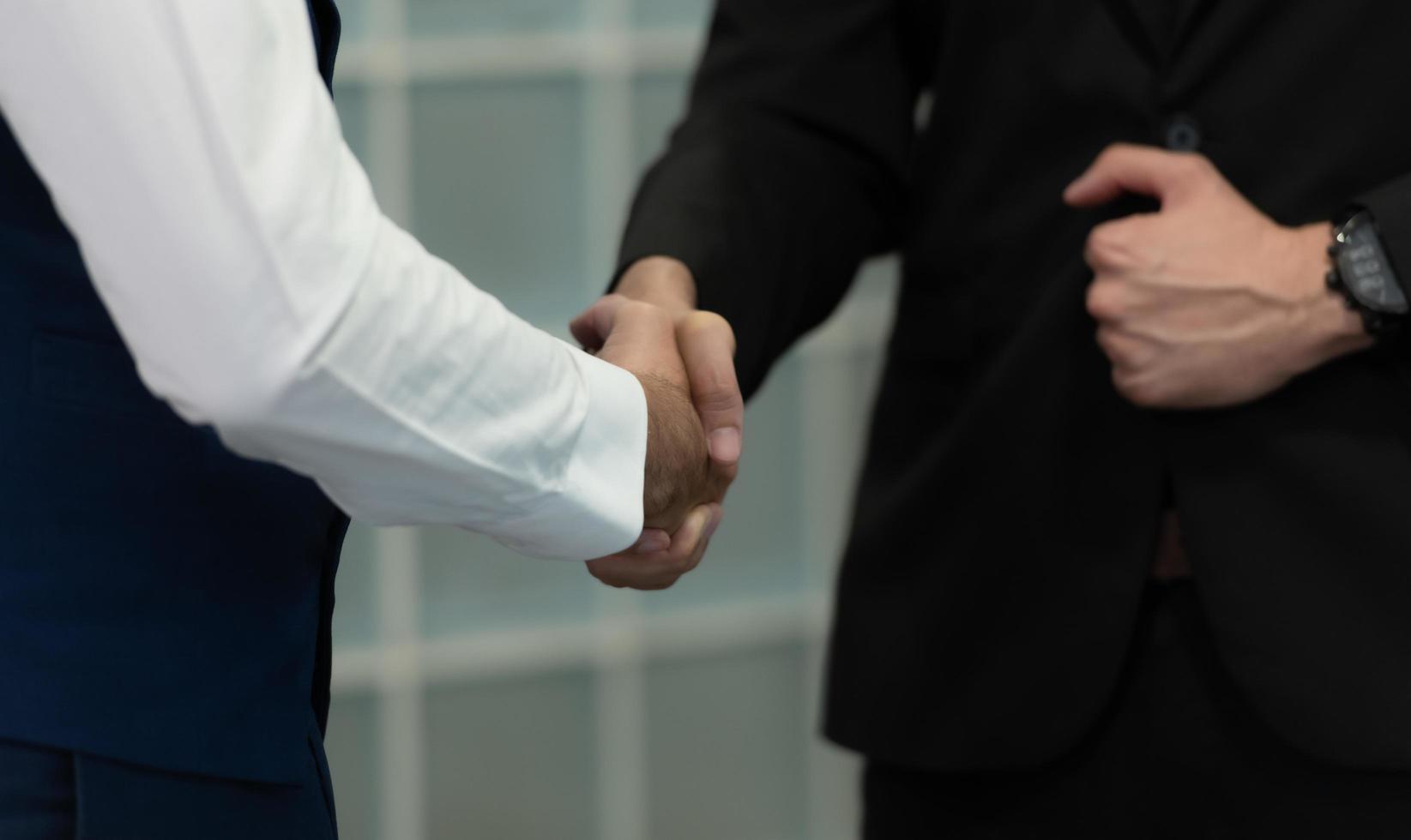 New business people in the conference room are exchanging information with each other along with rehearsing important information photo