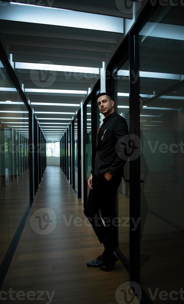 Businessman in the corridor in the conference room Relax with various posture before presenting work and new projects to the management team photo