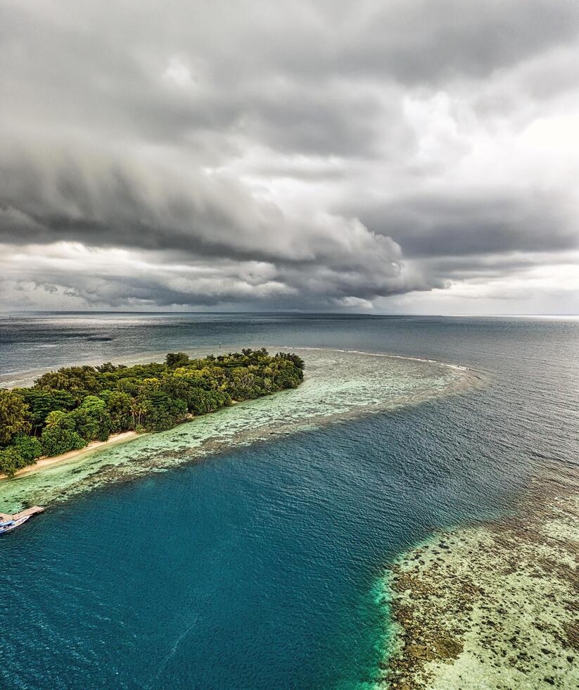 Aerial Photography of Islands Under Cloudy Sky photo