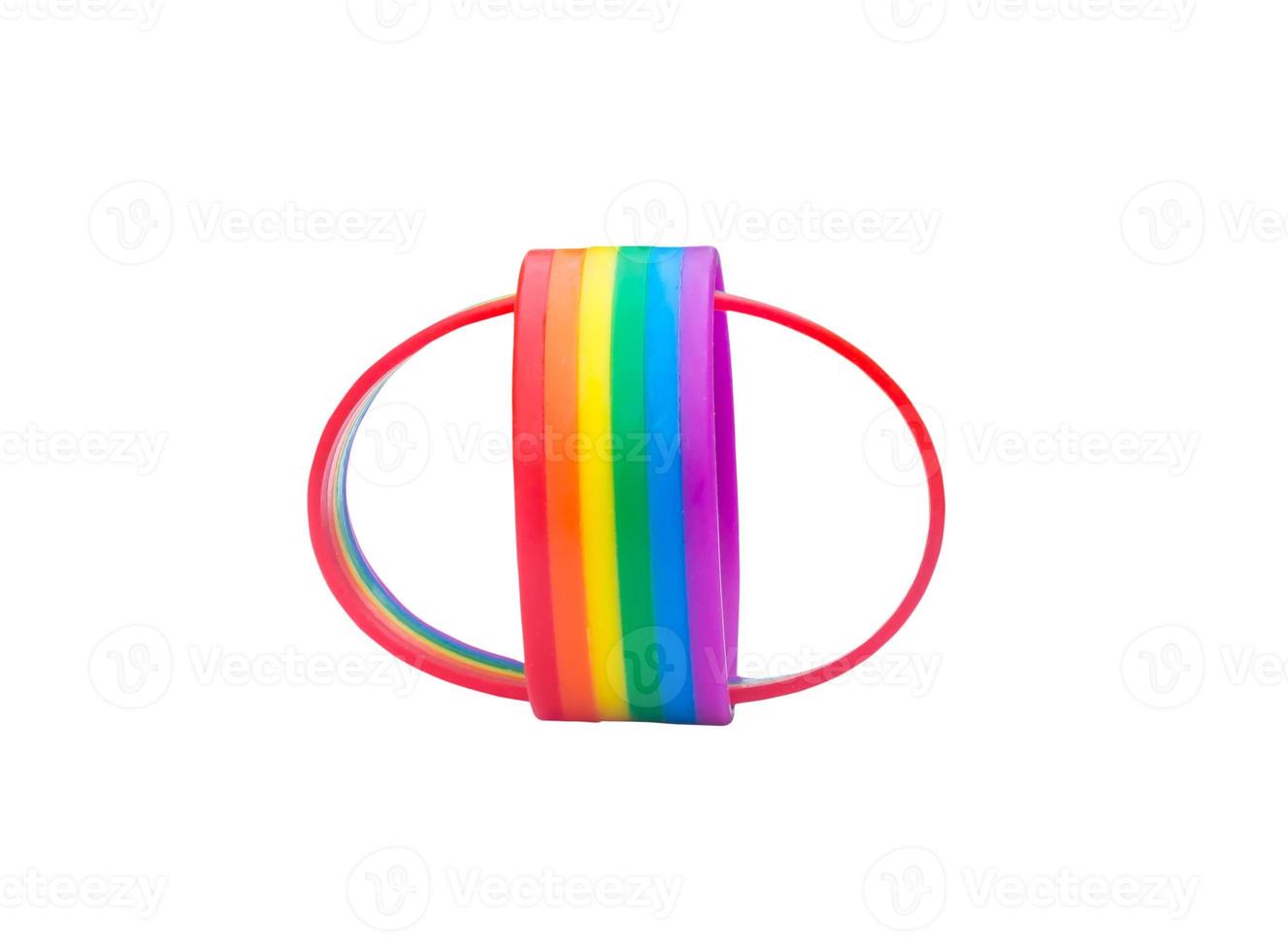 Two colorful rainbow wristband, lgbtq people symbol in strange shape isolated on white background with clipping path. Concept of lgbtq wristband wearing to support and attend celebration photo