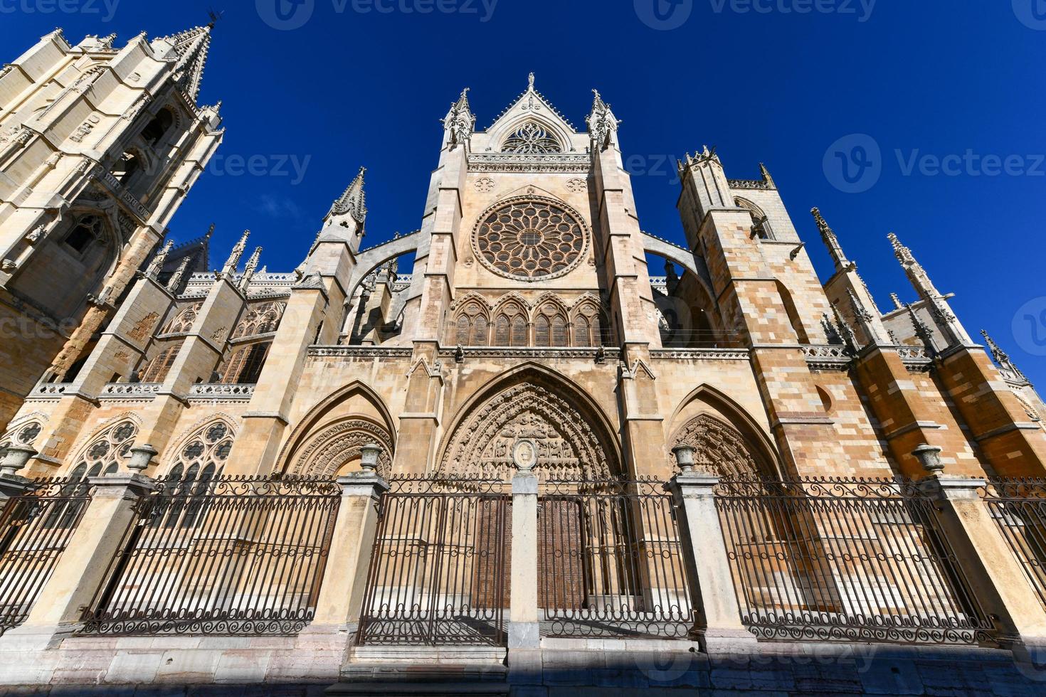 Main gothic facade of Leon Cathedral in the evening, Spain photo