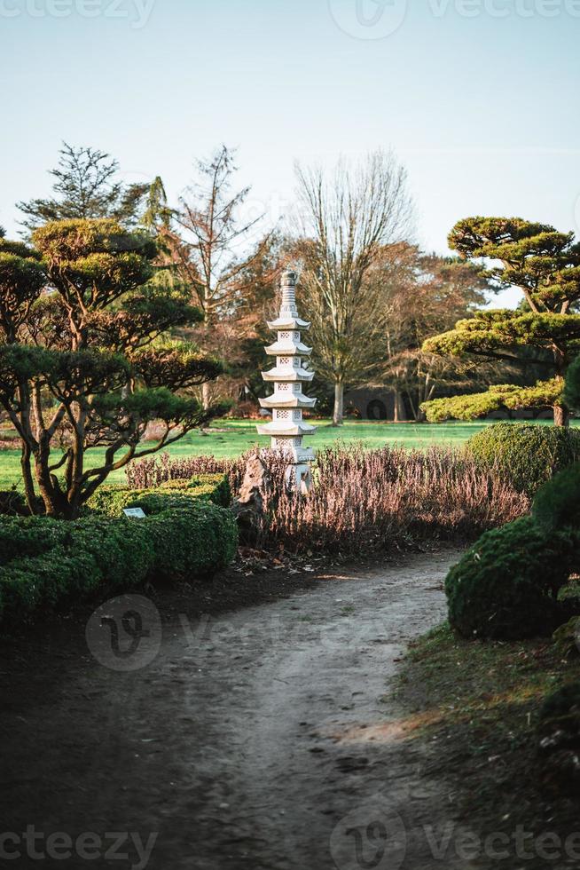 Japanese stone pagoda at a beautiful spring day photo