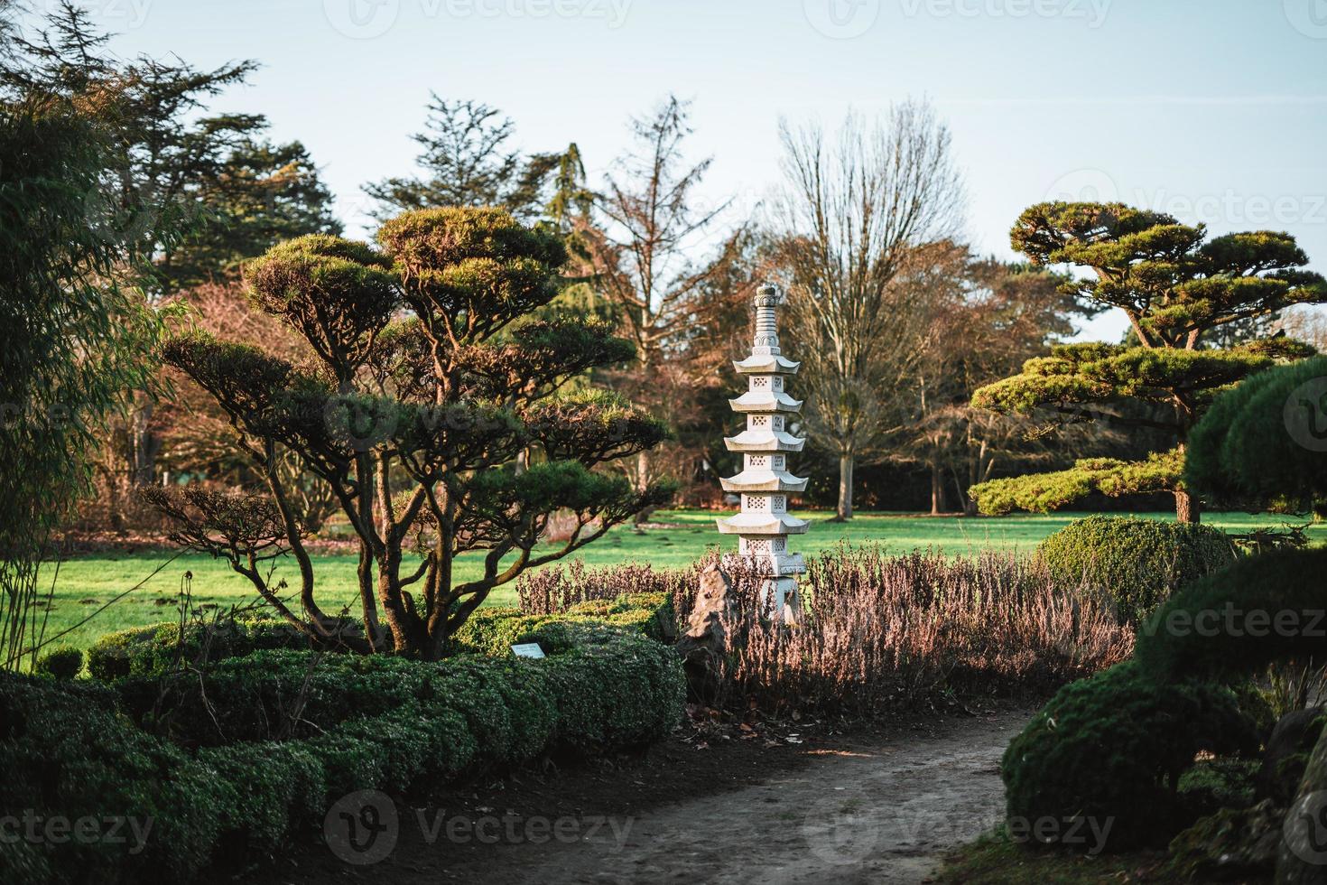 Japanese stone pagoda at a beautiful spring day photo