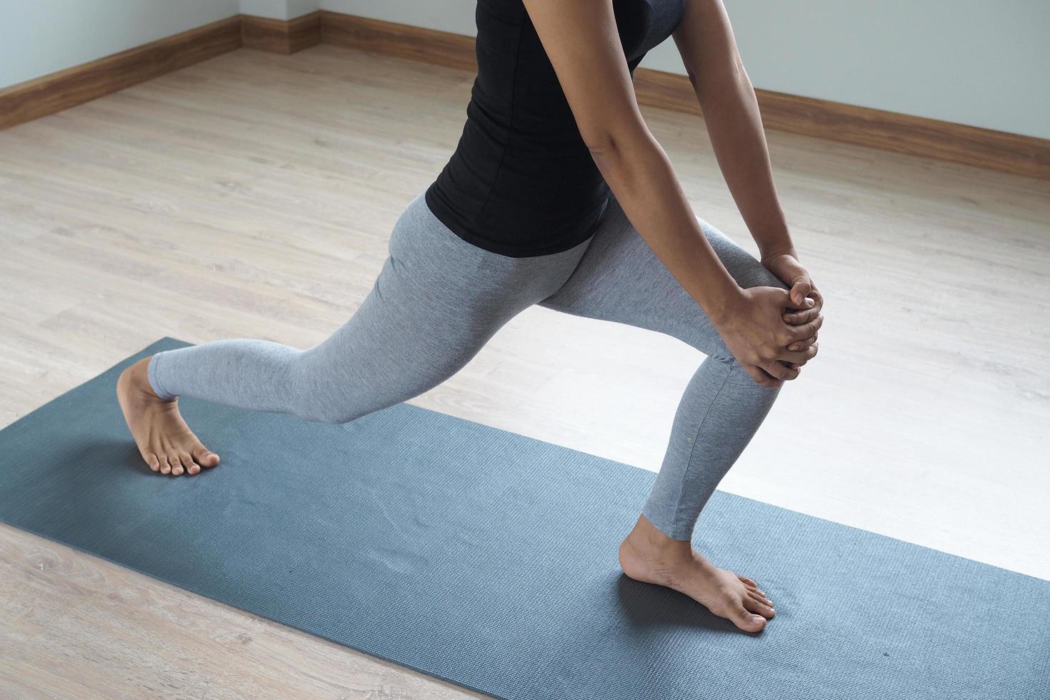 Women exercising to stretch leg muscles. Warm up photo