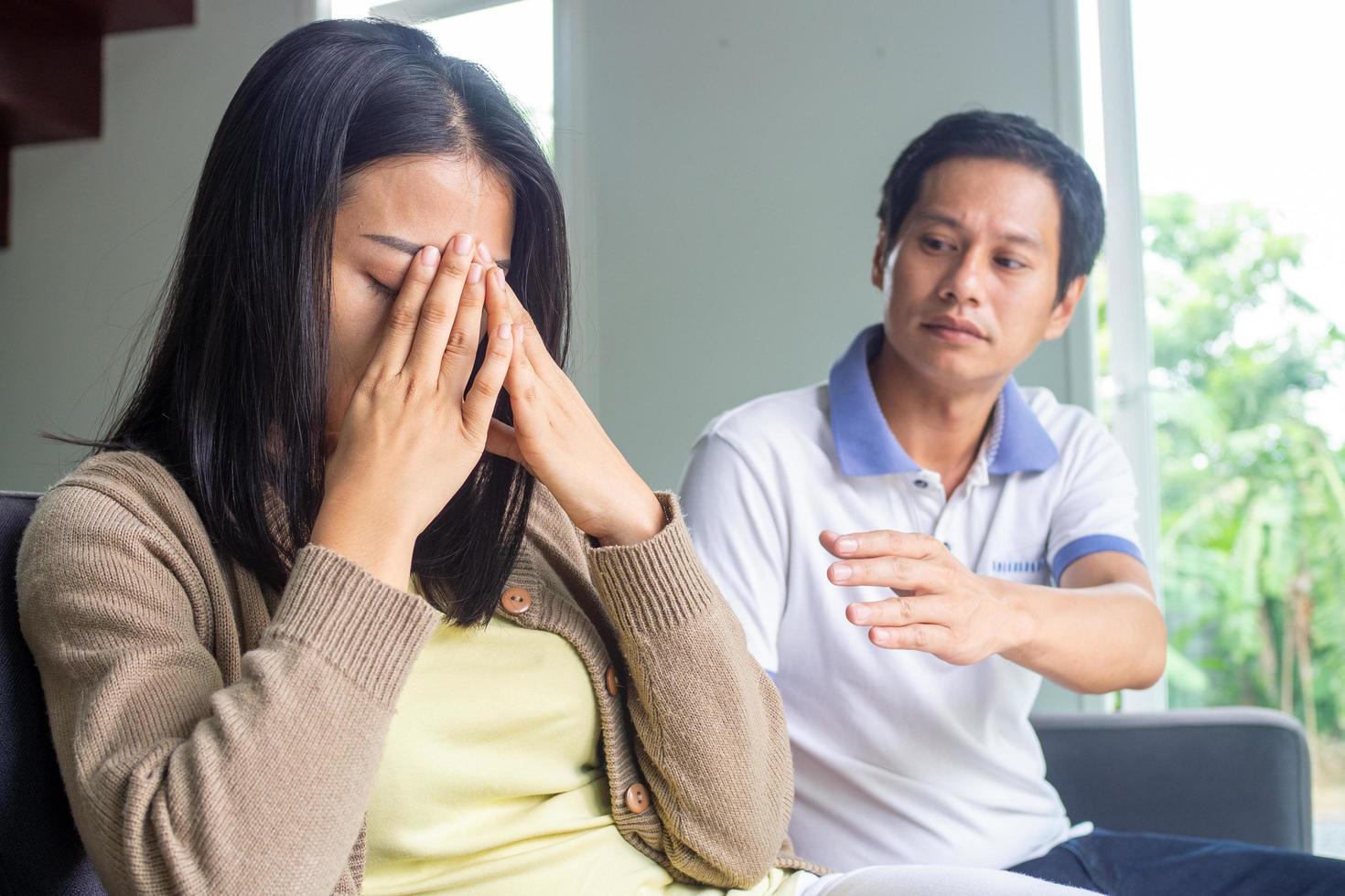 The woman felt depressed, upset and sad after fighting with her husband's bad behavior. Unhappy young wife bored with problems after marriage. photo