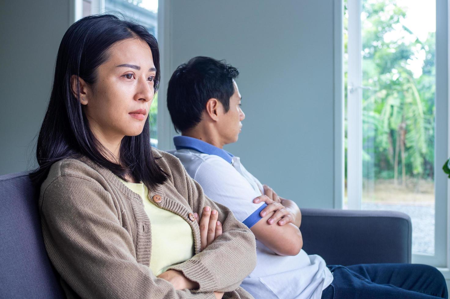 Couples are bored, stressed, upset and irritated after quarreling. Family crisis and relationship problems that come to an end photo
