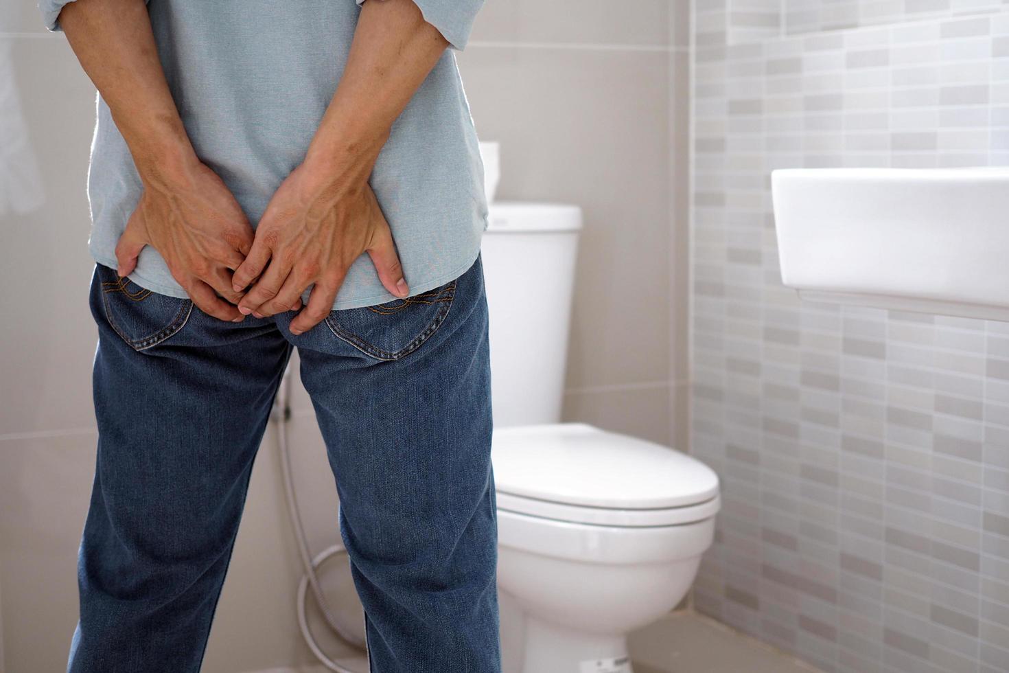 Men have diarrhea and are looking for shit. photo
