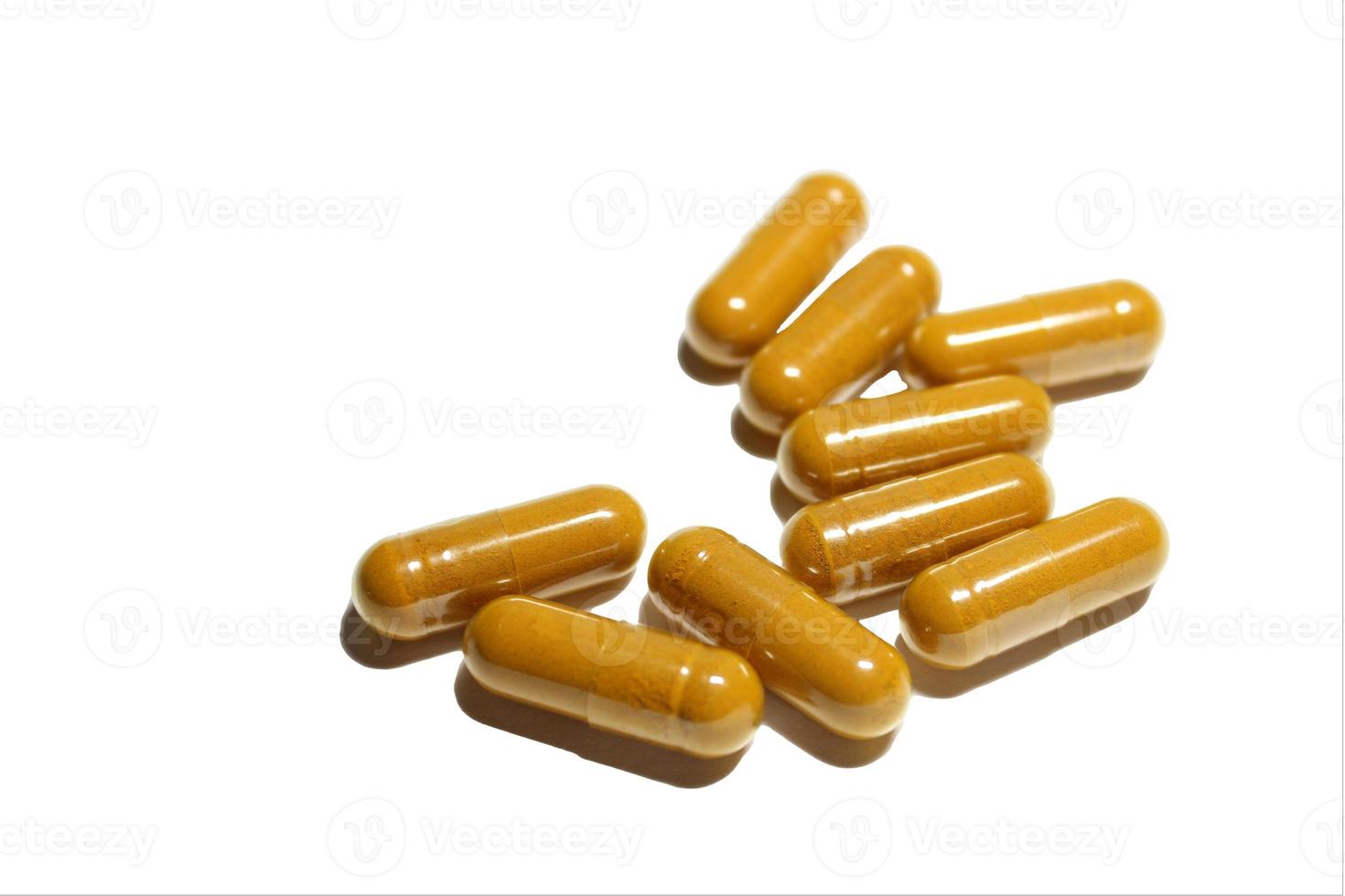 Herbal Capsules on white background photo