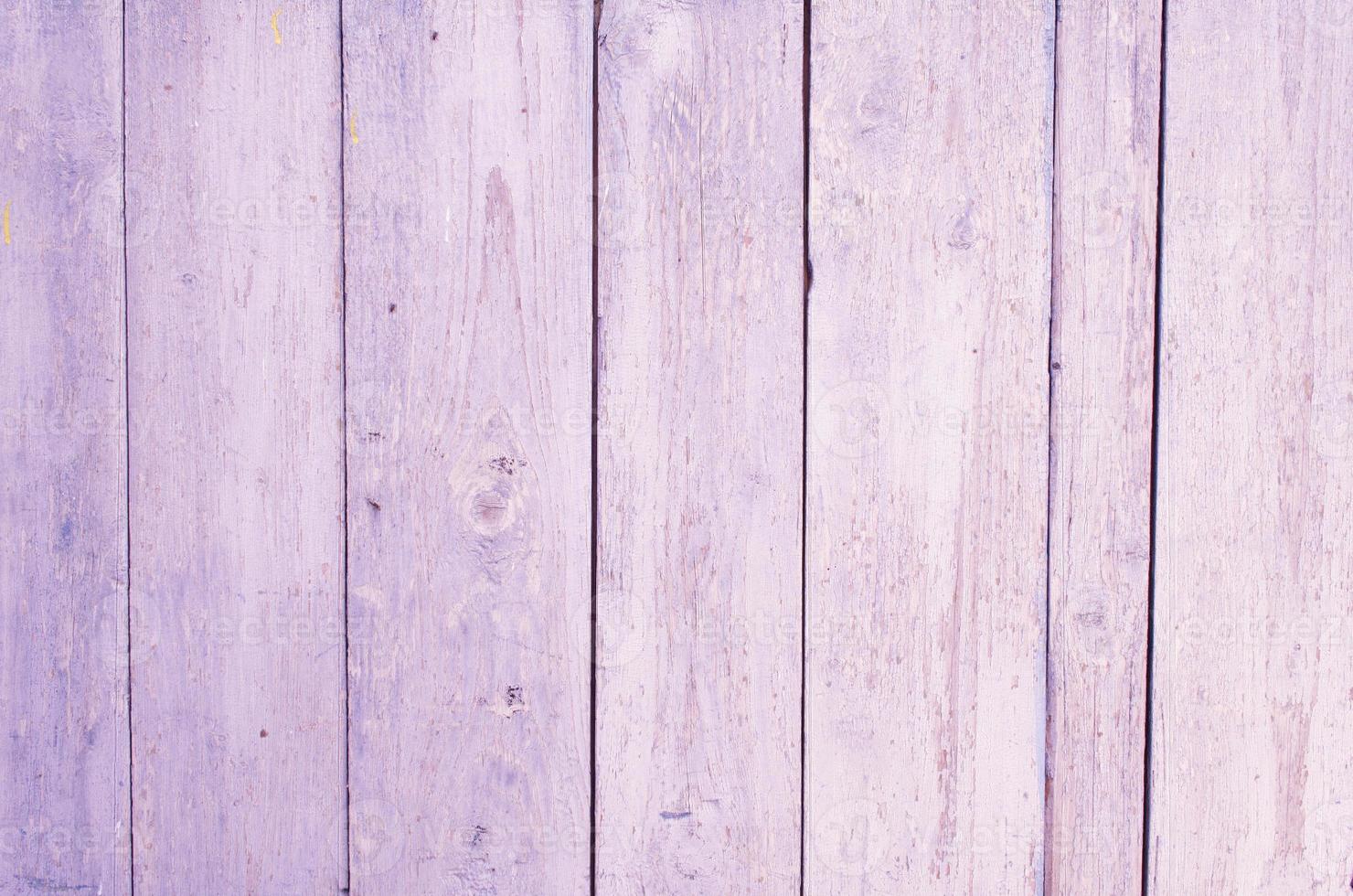 wooden vertical boards painted in lilac color. lilac wooden background photo