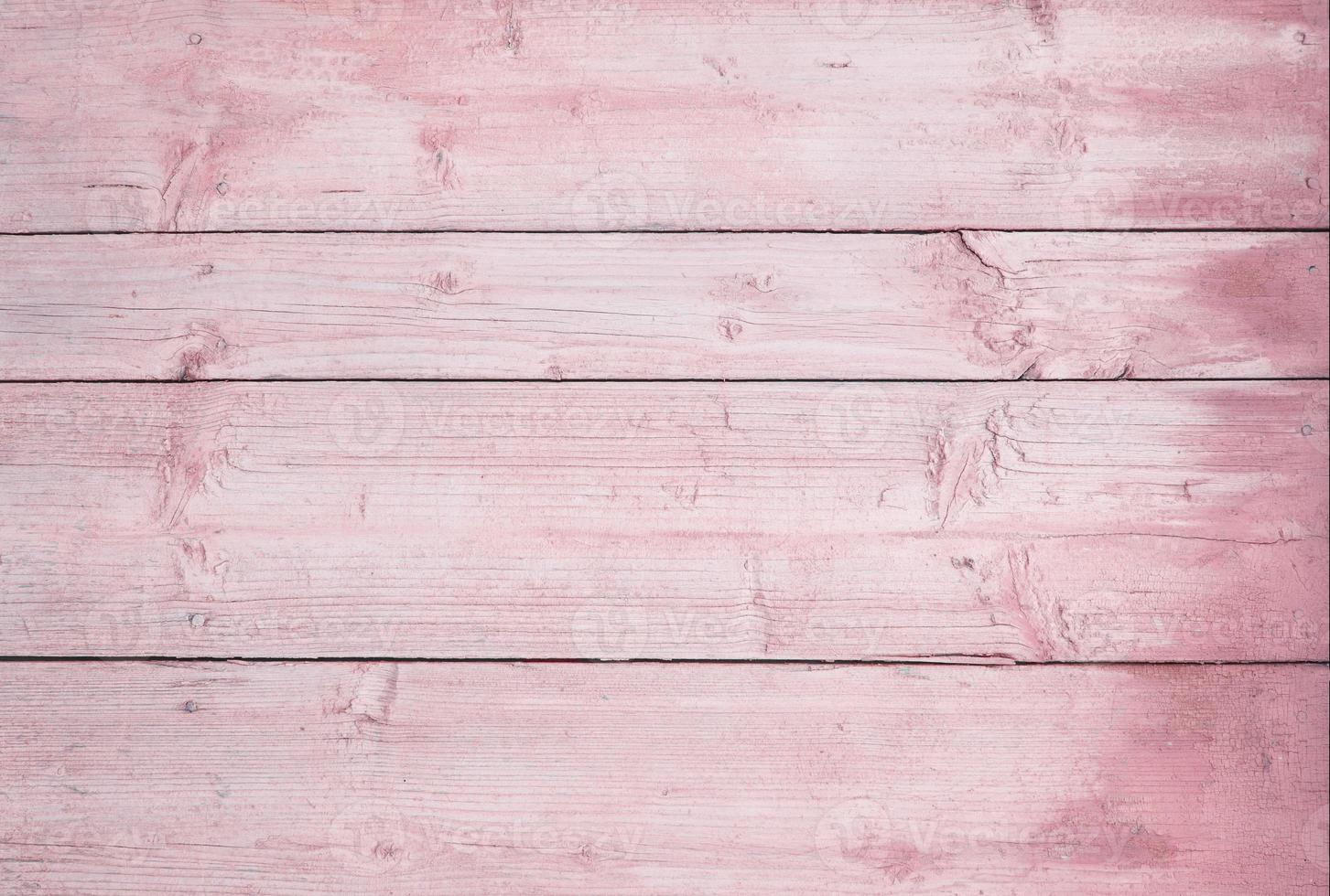 wooden horizontal boards painted pink. pink wooden background photo