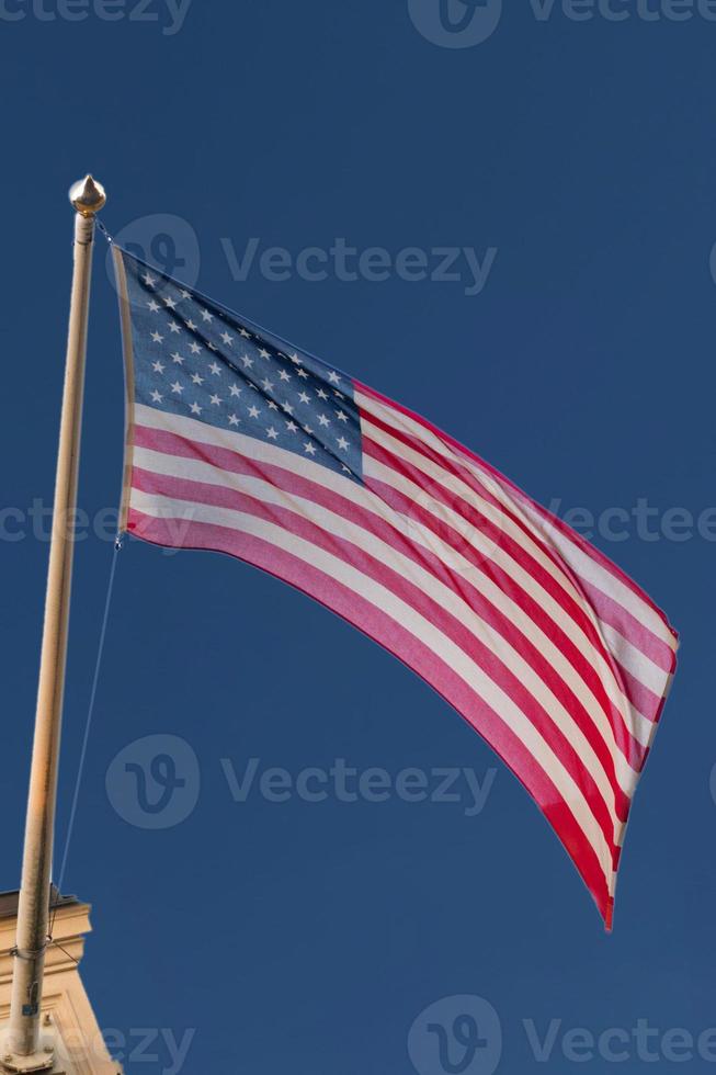 Usa American flag stars and stripes isolated on blue photo