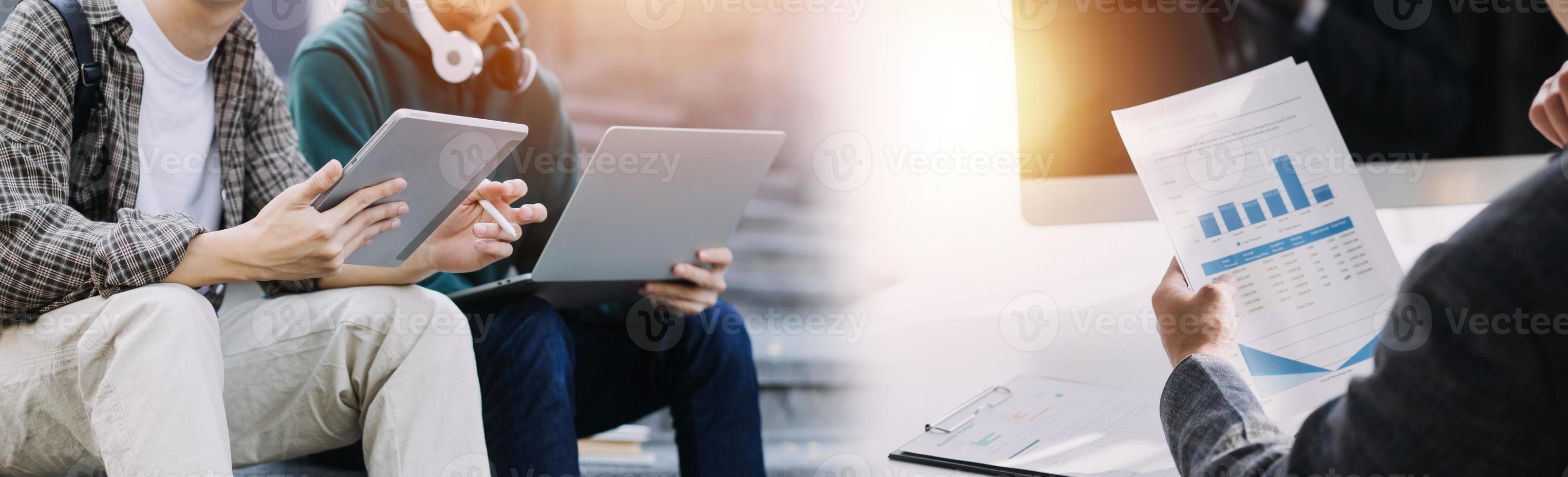 Financial analysts analyze business financial reports on a digital tablet planning investment project during a discussion at a meeting of corporate showing the results of their successful teamwork. photo