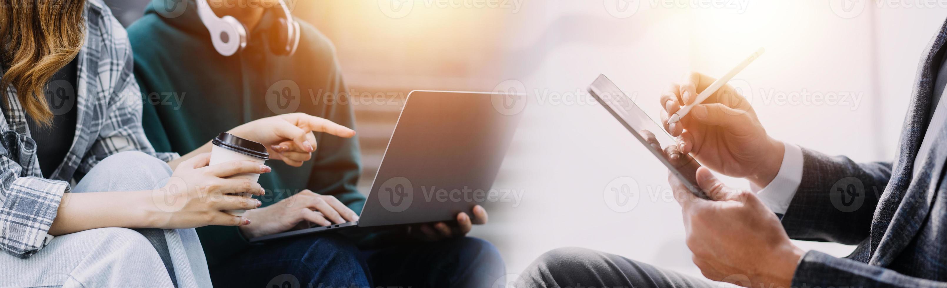 Financial analysts analyze business financial reports on a digital tablet planning investment project during a discussion at a meeting of corporate showing the results of their successful teamwork. photo