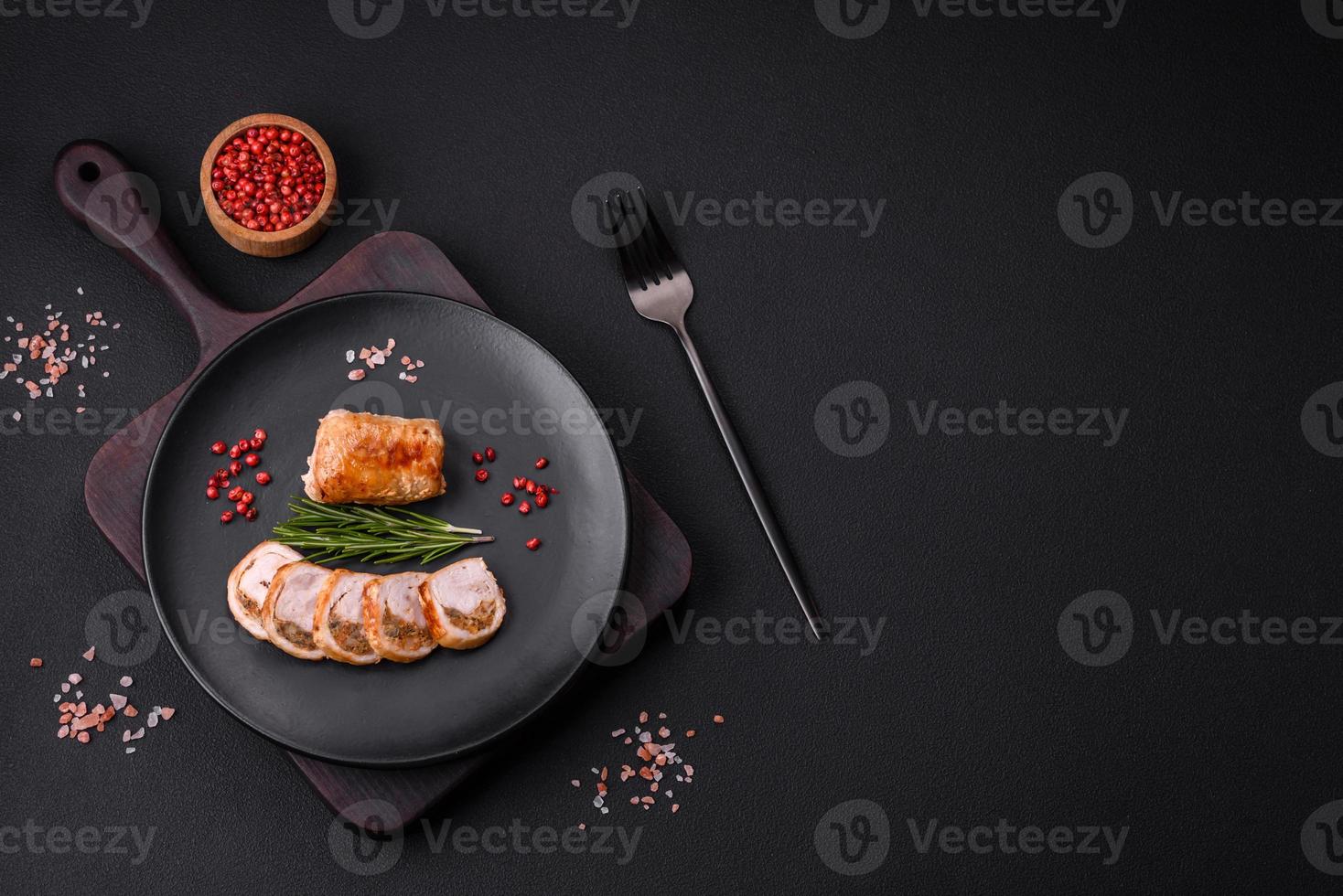 Delicious chicken or pork meat roll with mushrooms, cheese, spices and herbs photo