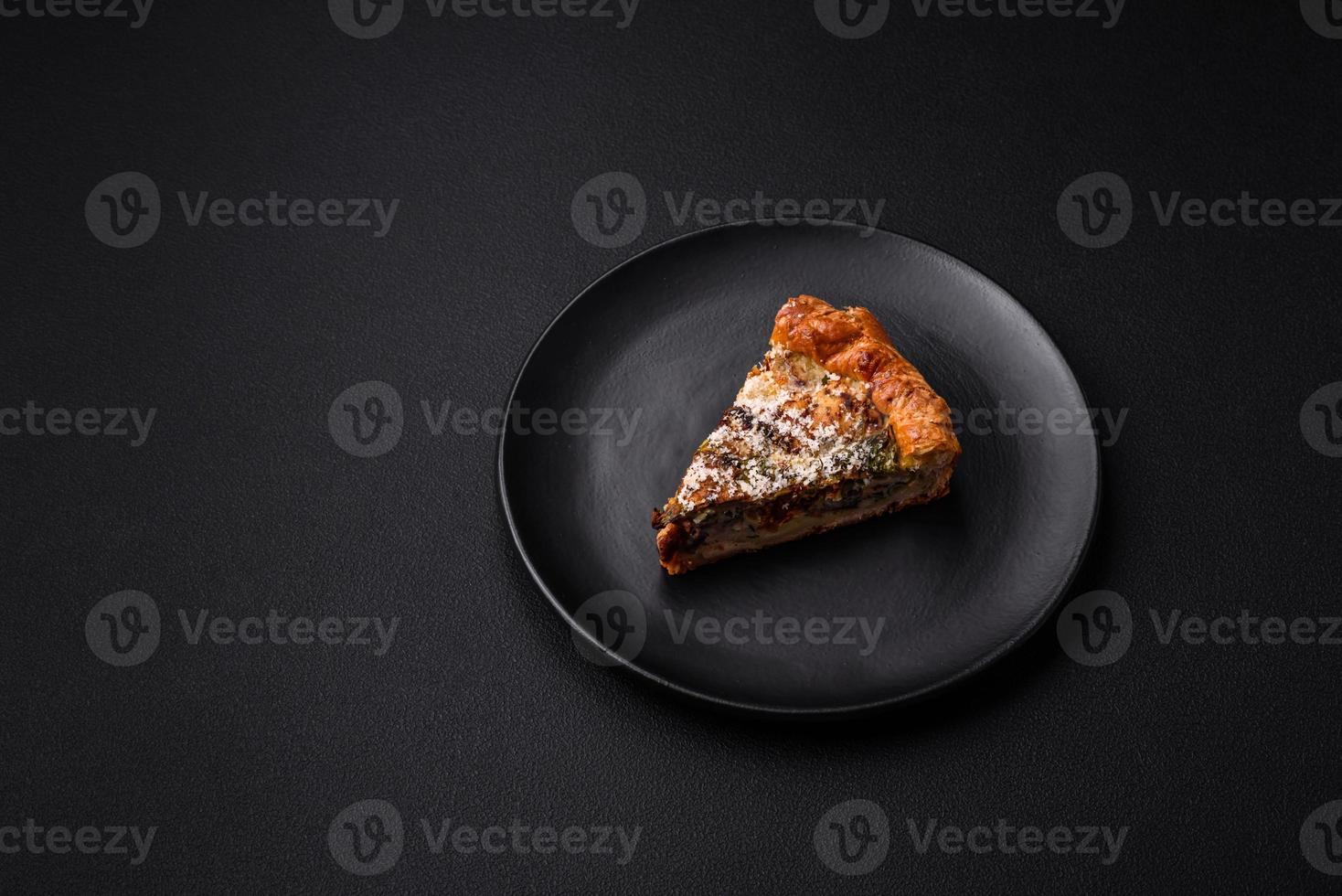 Delicious quiche with chicken, cheese, herbs, spices and herbs photo