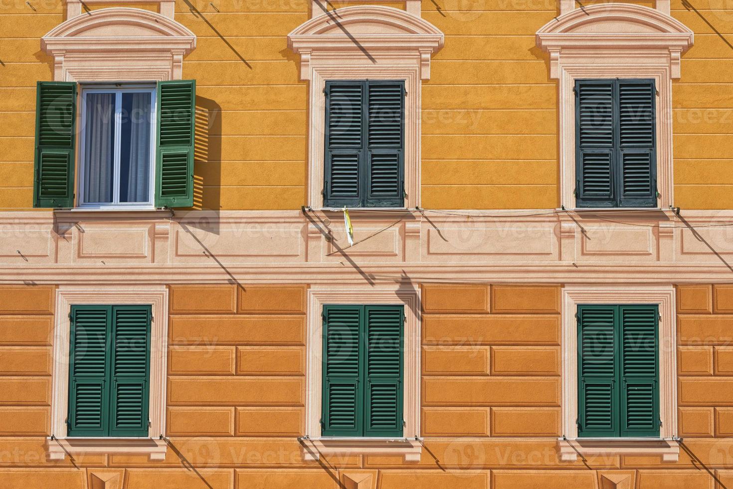 Italian colorful building with painted Plaster photo