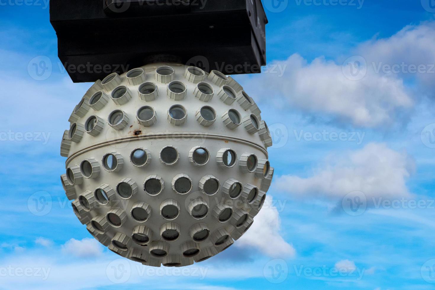 light rotating ball on sky background photo