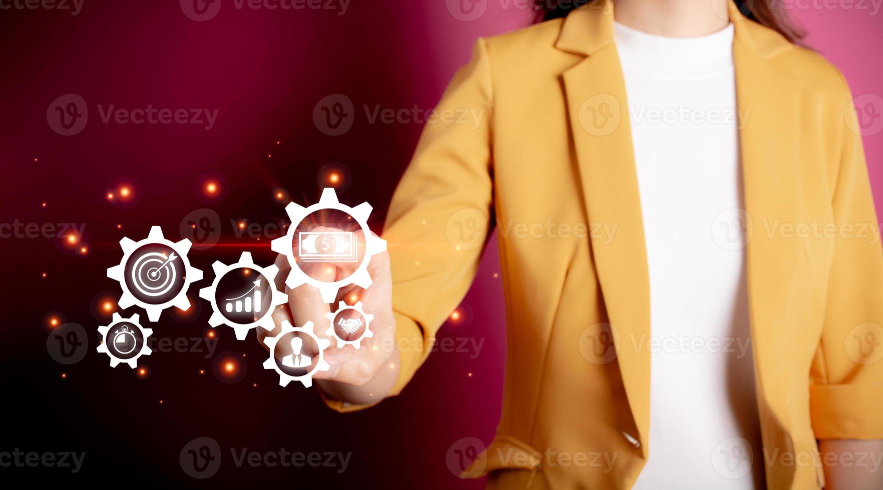 Business process management and workflow automation diagram with gears and icons.  Manager touching interface. Concept of achieving business goal. photo