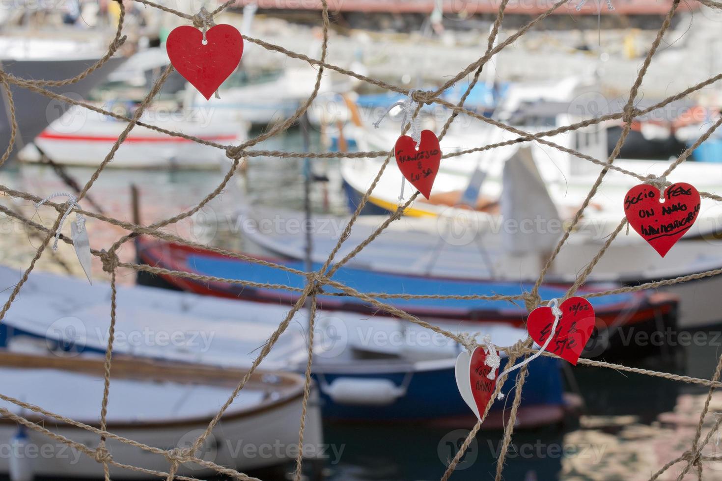 Love messages hanging on fisherman net photo