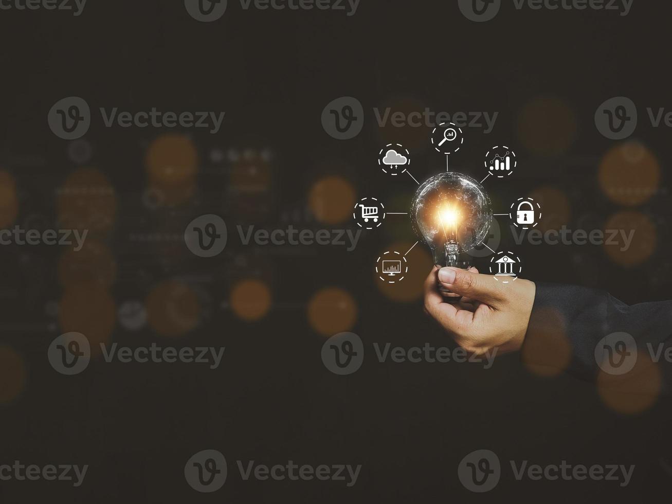 businessman holding a light bulb global internet connection strategic planning analysis and development modern concept ideas photo