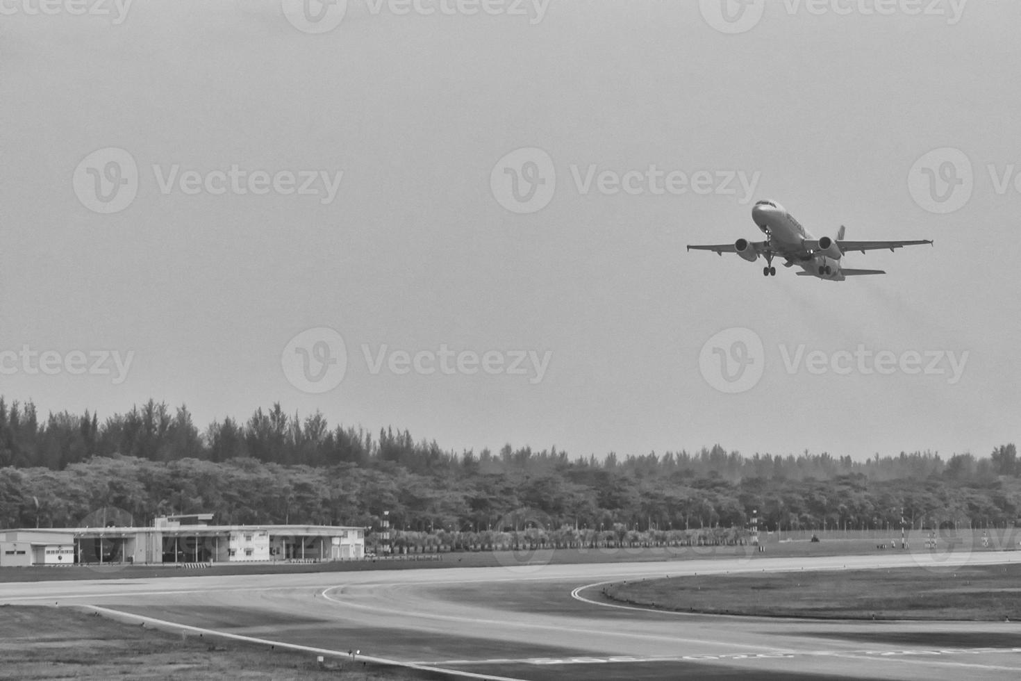 airplane while taking off in Changi Airport photo