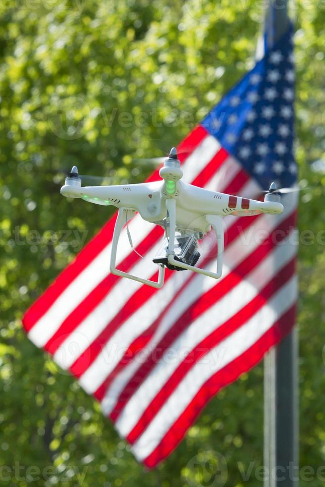 A security drone on stars and stripes USA flag photo