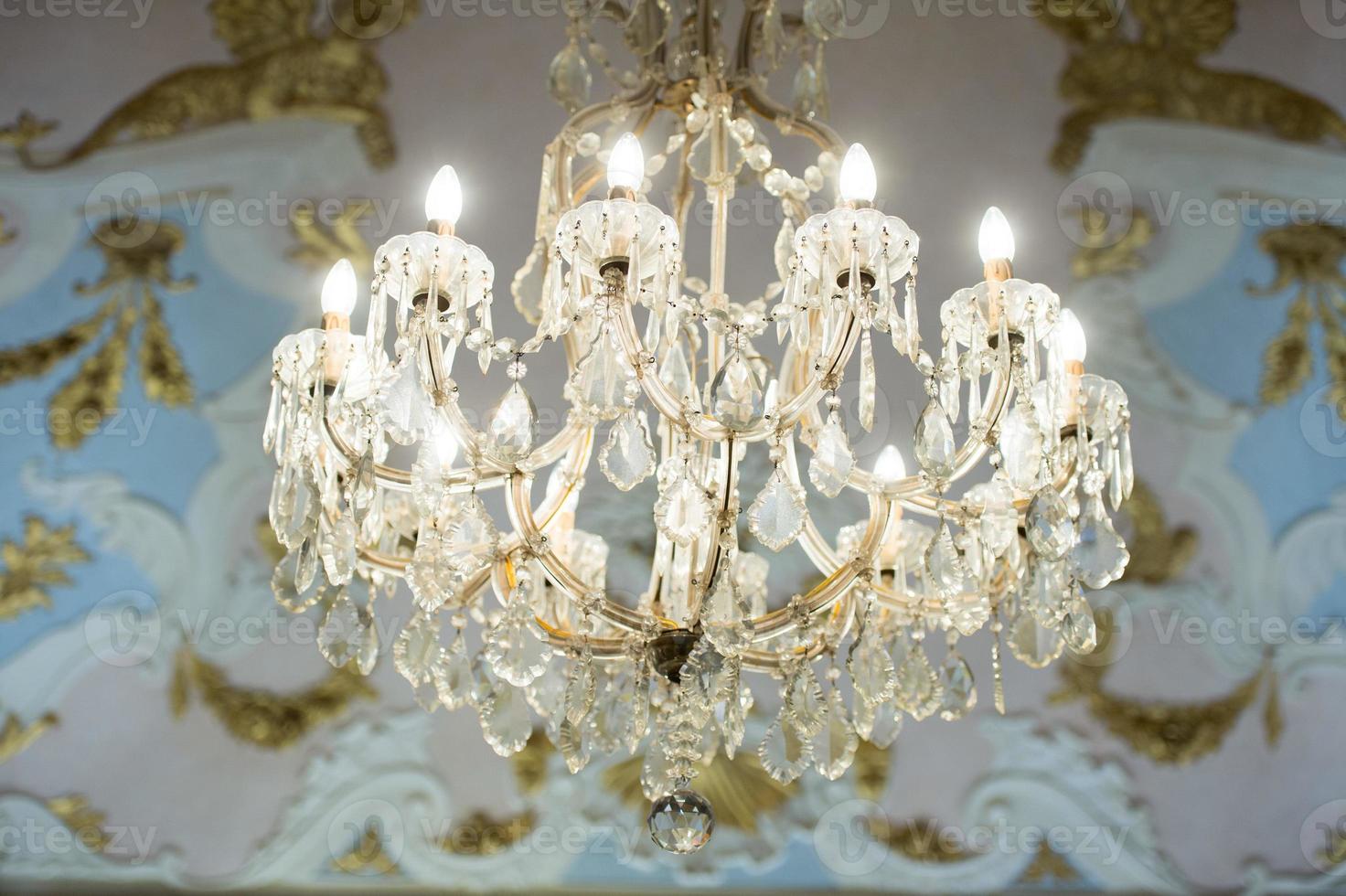 glass pendant detail of hall chandelier photo