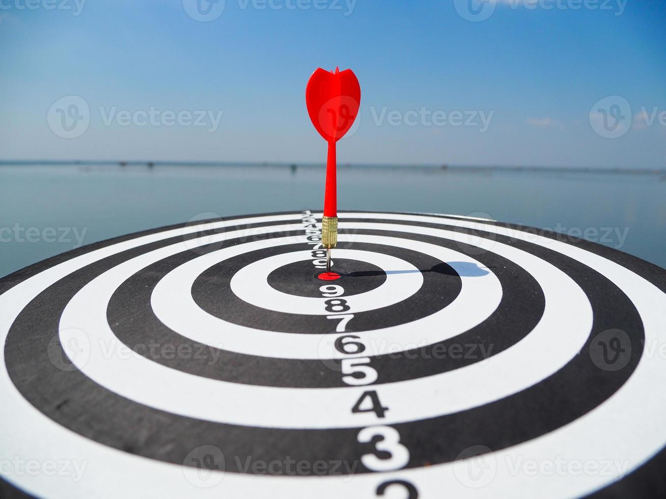 success target business darts red target in the center background is a large sea photo