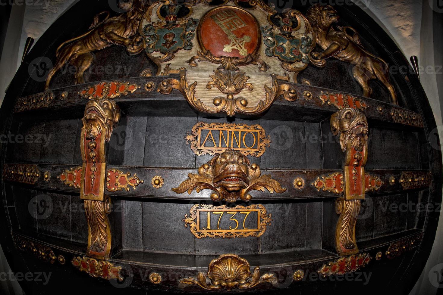 XVII century antique big Wine Barrel in a german cellar photo