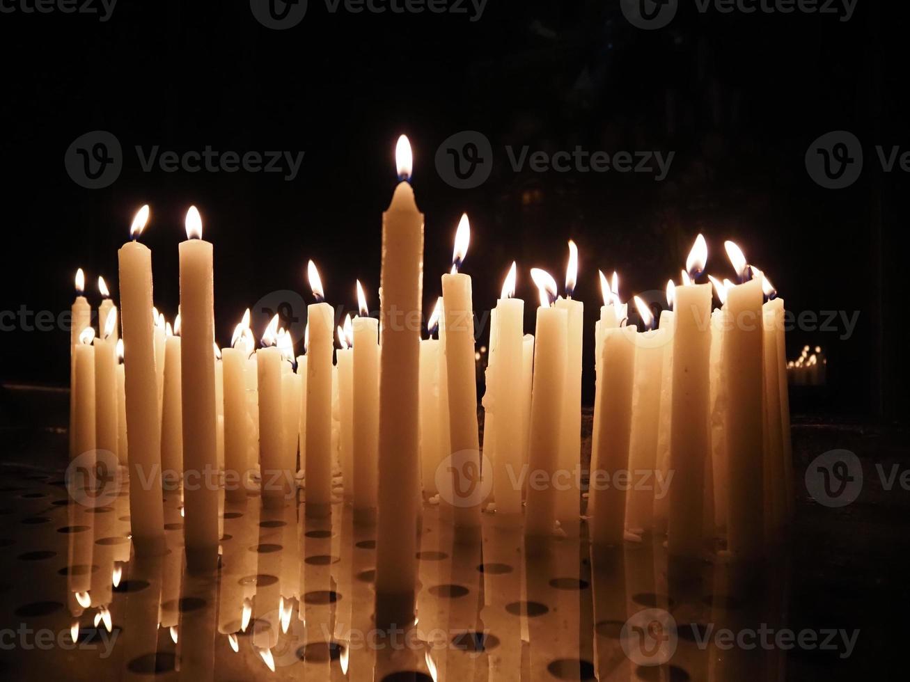 church votive candles white flames photo