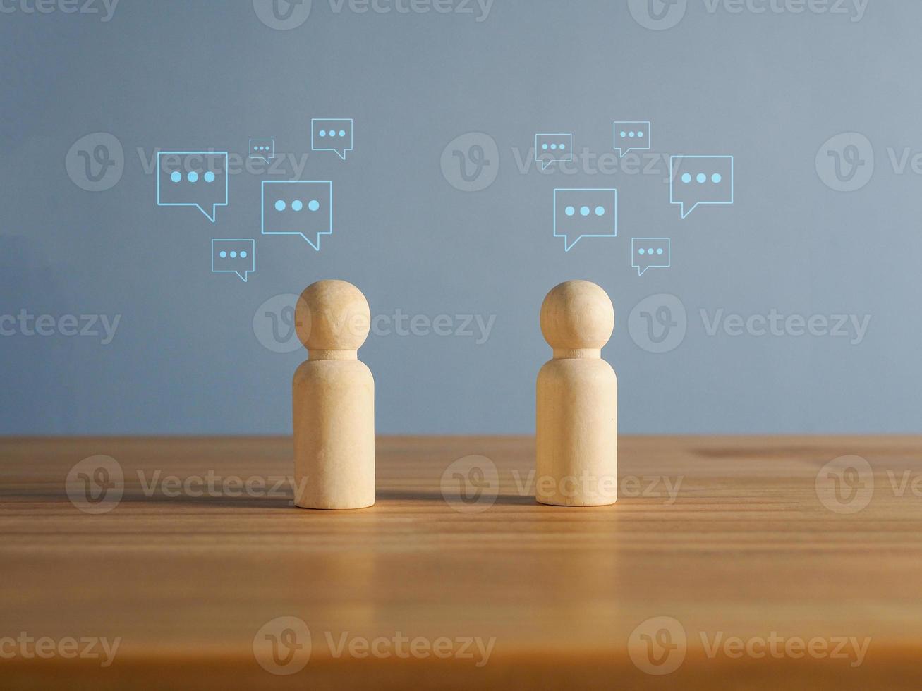 ChatGPT chat together with artificial intelligence. A wooden man who is having a conversation through AI intelligent robot technology in future marketing analysis. photo